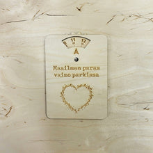 Katso kuvagalleriassa, Puinen parkkikiekko