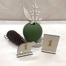 Katso kuvagalleriassa, Pöytänumerokyltit