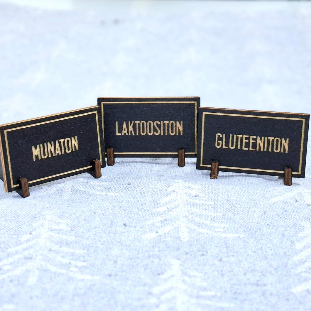 Kyltit juhlapöytään: laktoositon, gluteeniton, kasvis, vegaaninen